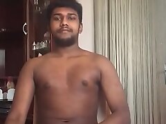 Indian lad in living room