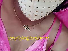 Indian crossdresser model Lara D'Souza in pink satin nighty