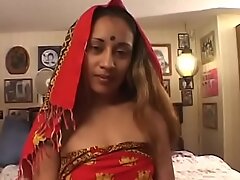 Indian slut gives white guy a blowjob coupled with then gets fucked in the bedroom