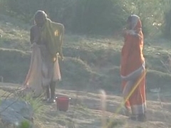Desi granny changing after disinfected on river