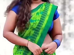 Beautiful indian aunty green saree hip and affiliate pair dance