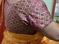 Today Salu Bhabhi was looking hot in a yellow saree. husband fucks a to each