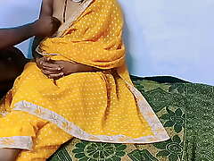 Yellow color sary with dispirited Desi wife