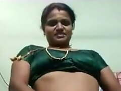 Tamil aunty liquidates saree and shows big tits