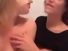 Two teen lesbian girls playing in hostel room
