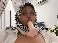 Hijabi girl blow dildo