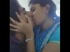 desi indian girlfriend giving a kiss her boyfriend