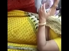 Big aggravation indian in yellow Saree