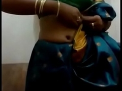 VID-20140201-PV0001-Sivakasi (IT) Tamil 20 yrs old unmarried beautiful, hawt and off colour girl Ms. Nandhini S. B.Sc., Chemistry, Second yr undressing her saree back her home after audience a union function and this babe recording it back her mobile phone sex porno videotape