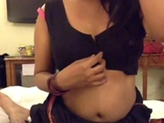 Sexy Desi Bhabhi Similarly Big Chest n Putting in Condom on Dick