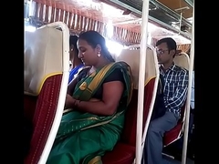 Aunty in bus.. blouse nipple visible... Watch delicately 1
